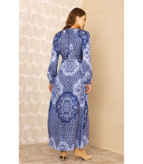 Vestido con botones delanteros, manga larga y puños fruncidos.