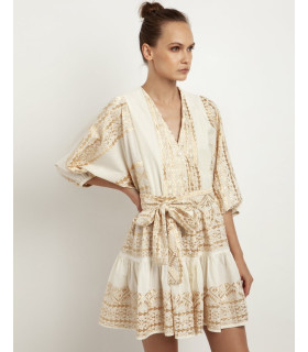 Dress with geometric embroidery in soft golden tones
