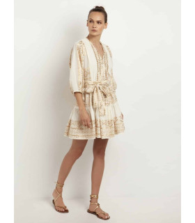 Dress with geometric embroidery in soft golden tones