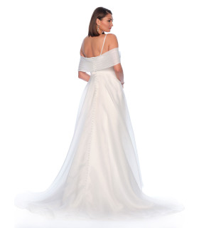 Off-shoulder organza dress with draped straps.