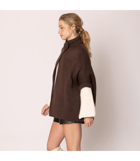 Ruana with high neck and button closure