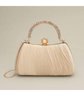 Bolso de mano con asa y cierre de perla adornado con diamantes
