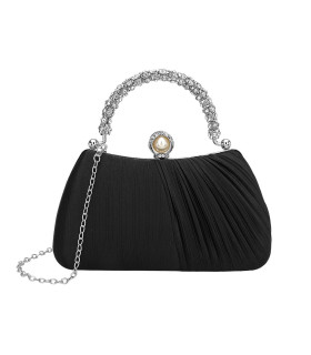 Handbag with handle and pearl clasp adorned with diamonds