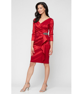 Dress with crossover neckline, decorative detail at hip.