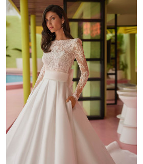 Dress with long-sleeved lace blouse and mikado skirt.