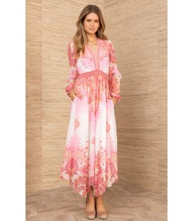 Dress with hip pockets, long sleeves with ruffle detail.