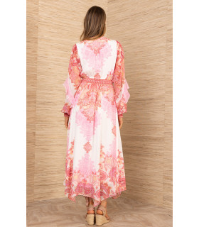 Dress with hip pockets, long sleeves with ruffle detail.