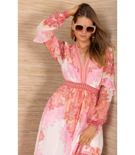 Dress with hip pockets, long sleeves with ruffle detail.