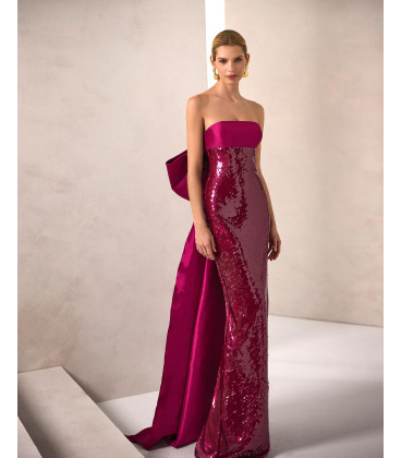 Strapless dress with sequined skirt and bow at the back