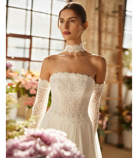 Strapless dress, lace blouse, flowing skirt.