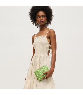 Bolso de mano con diseño tejido y estampado floral