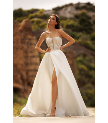 Vestido corset brillante de ballenas con falda de abertura en la pierna