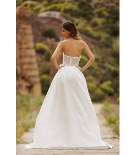 Vestido corset brillante de ballenas con falda de abertura en la pierna