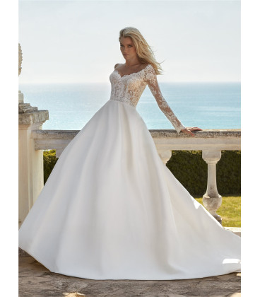 A-line dress with a plunging neckline and long sleeves