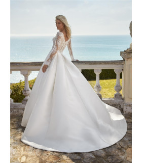 A-line dress with a plunging neckline and long sleeves