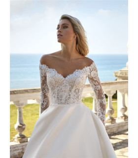 A-line dress with a plunging neckline and long sleeves