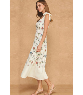 Dress with floral embroidery and bows on the shoulders