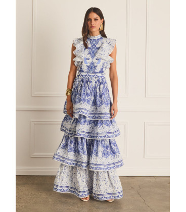 Vestido con volantes, cuello alto y falda escalonada