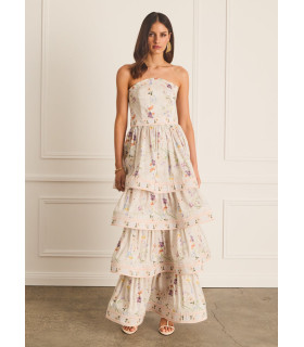 Strapless dress with tiered skirt and bow at the back