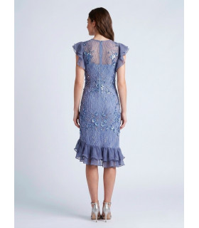 Dress with a closed round neckline, sleeves and asymmetrical hem with ruffles