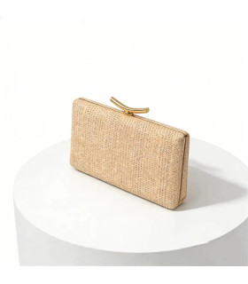 Woven straw bag with metal clasp