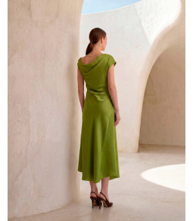 Dress with one shoulder exposed and pleats at the waist
