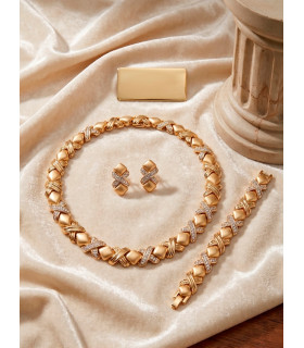 Necklace, earrings and bracelet set with a link design featuring the classic "X" and "O" motif